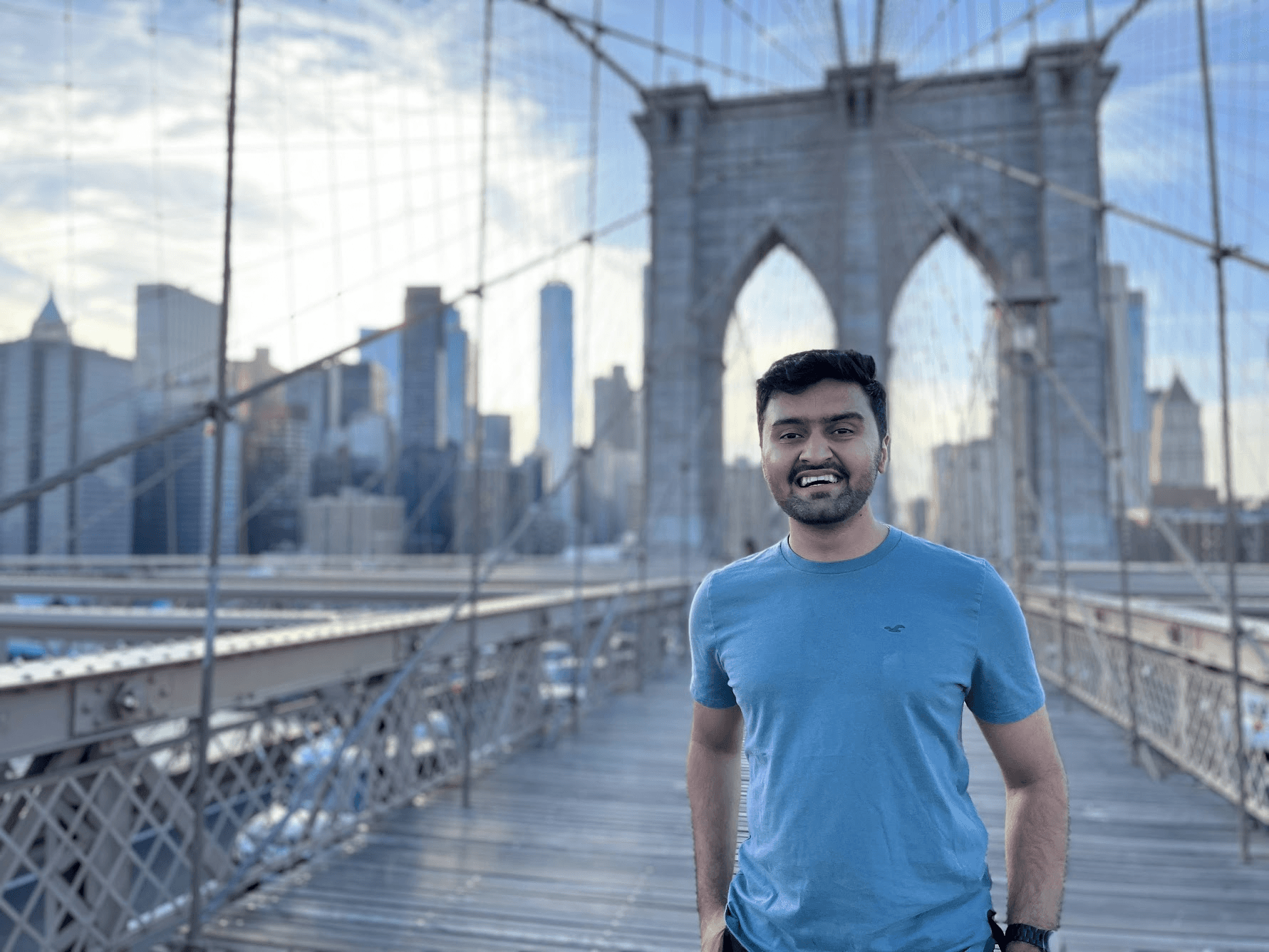 man filming on beach