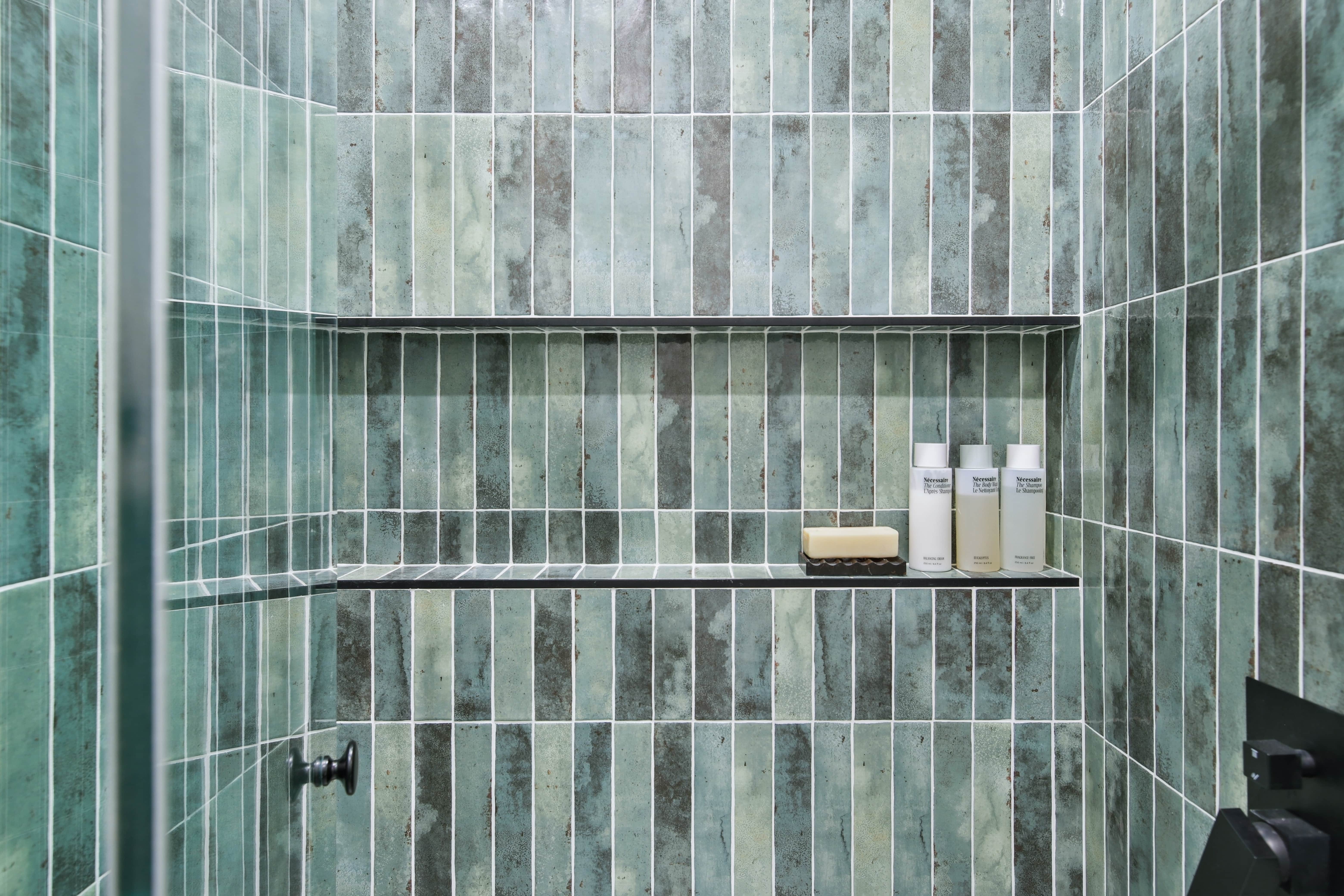 green tiled modern bathroom