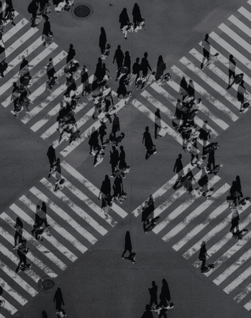 Aerial view of pedestrians crossing at a busy intersection