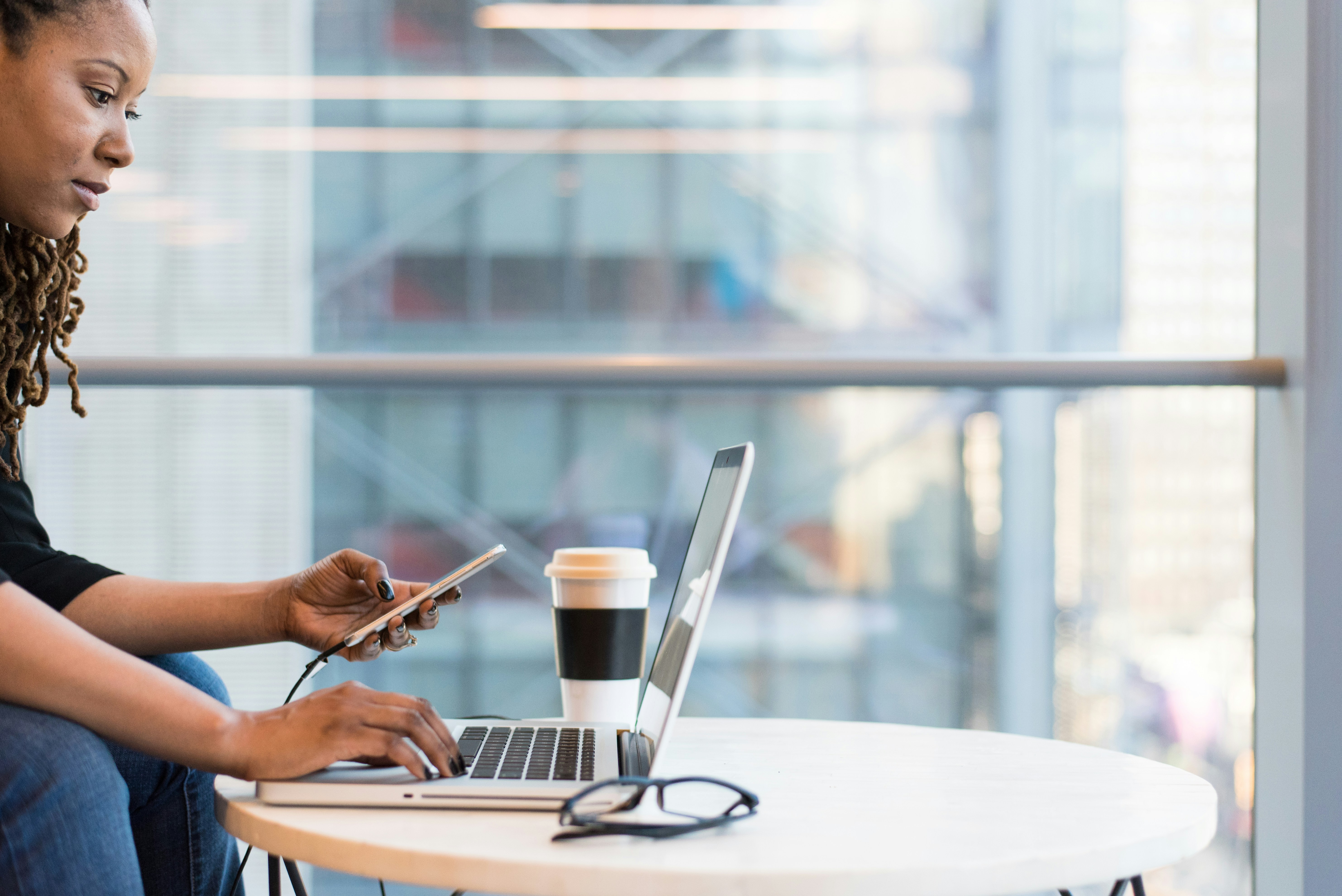 woman sending emails - Email Overload