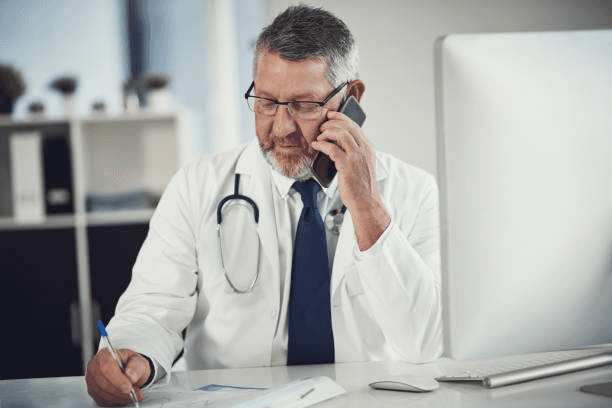 Tether Supervision physician providing patient follow-up through a 24/7 post-reaction hotline, ensuring continuous clinical support and safe management after contrast-enhanced CT or MRI procedures.