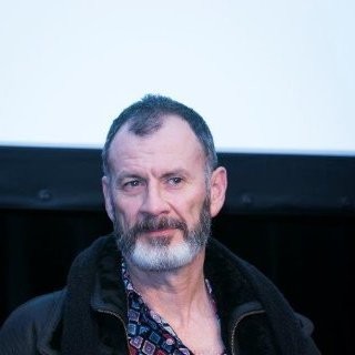 man in black button-up shirt