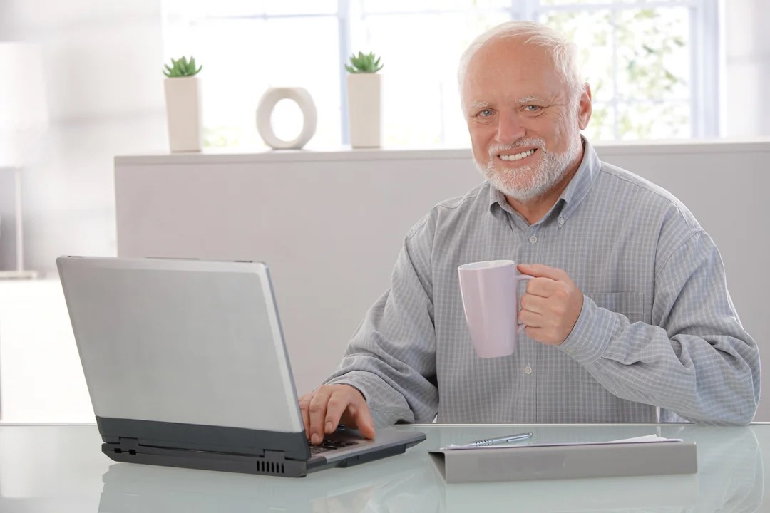 macbook air displaying woman in white shirt
