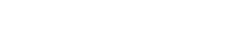 Black and white portrait of a smiling person with curly hair