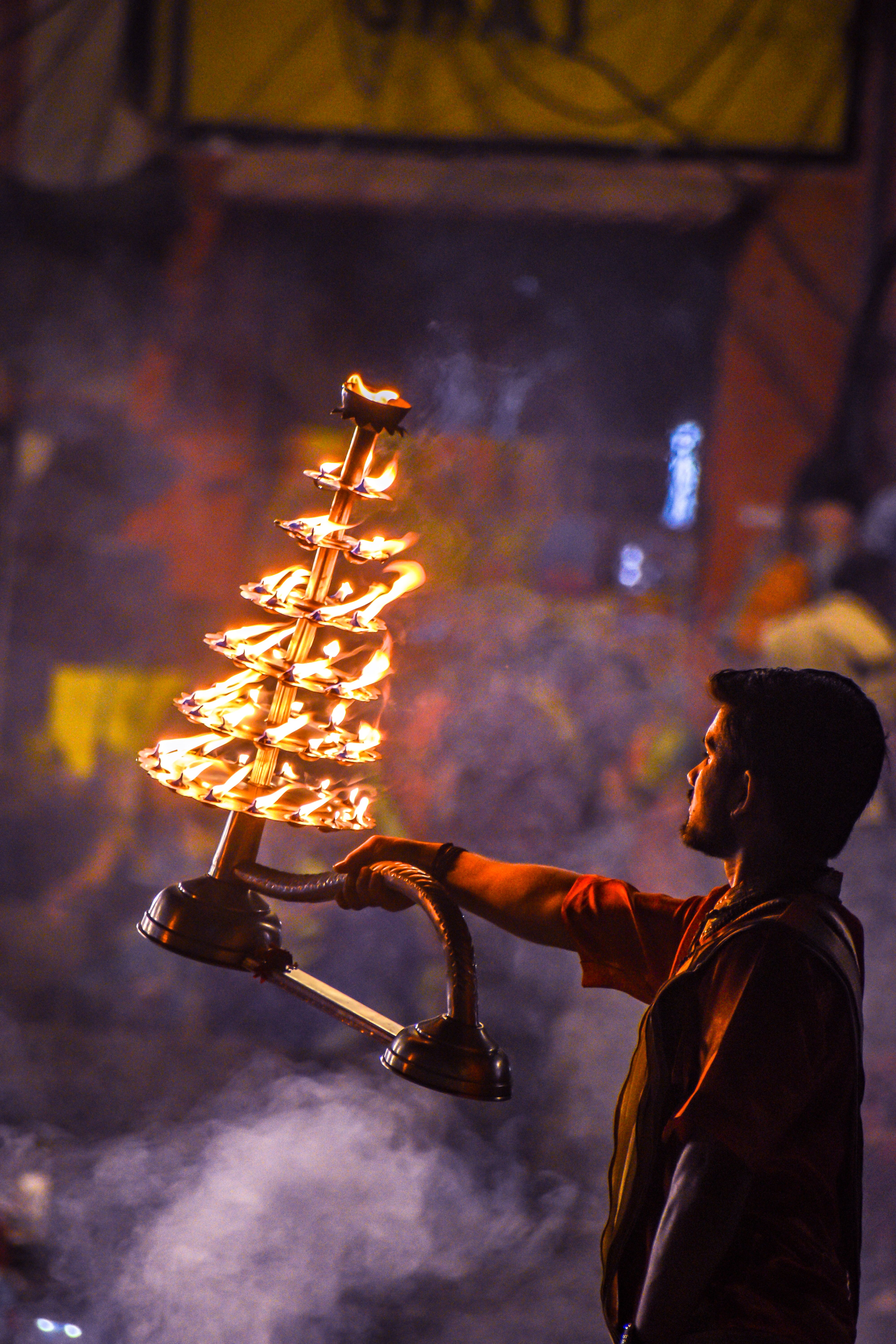 Person balancing a large item on their head.