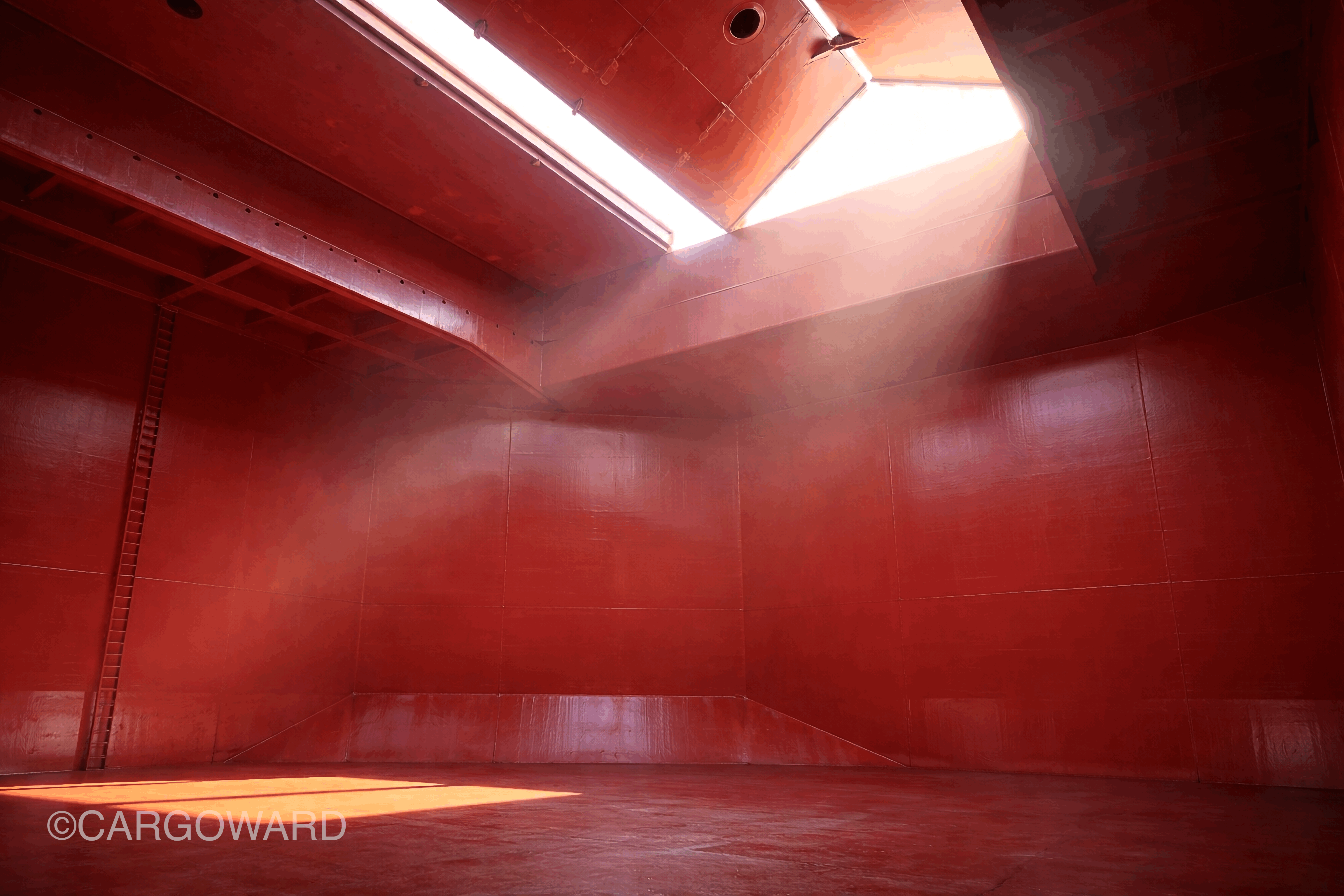 Cargo hold painting completed in Brazil, showing freshly coated hold surfaces under open hatch after cleaning and airless coating application.