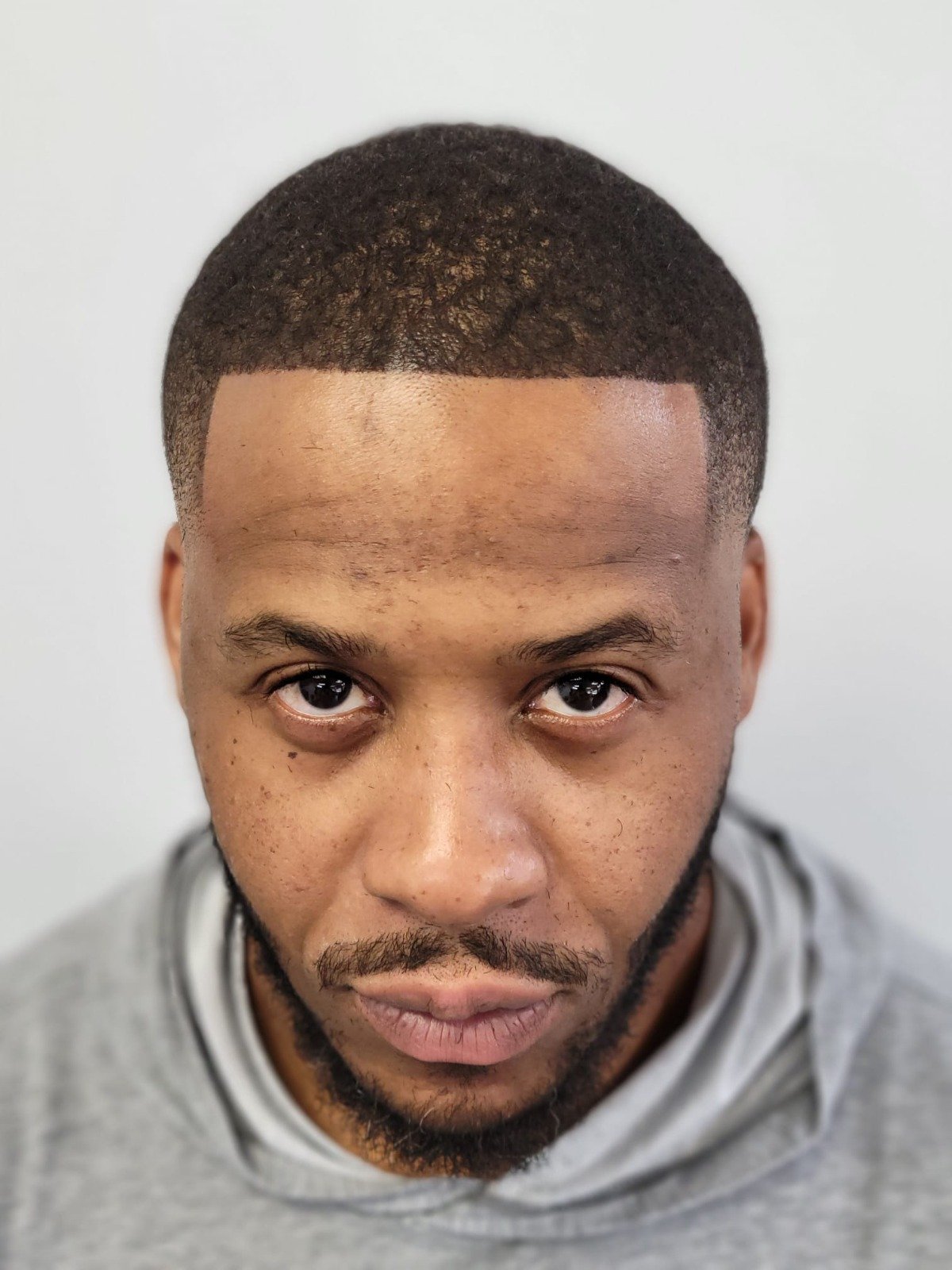 Men’s haircut by The Rooted Barber Experience — gallery photo 7