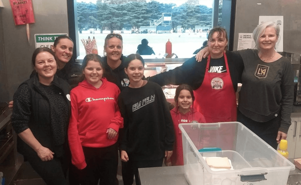 Club volunteers assisting at the North Geelong Warriors canteen on matchday.