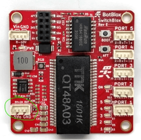 Top view of SwitchBlox Rev E with the 5V 2A output connector highlighted in green