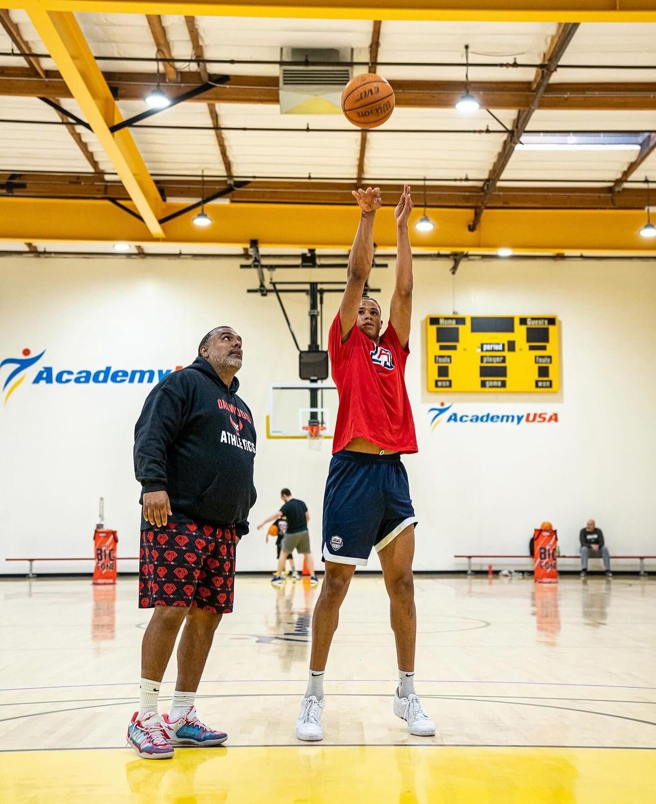 Olin Simplis teaching free throws