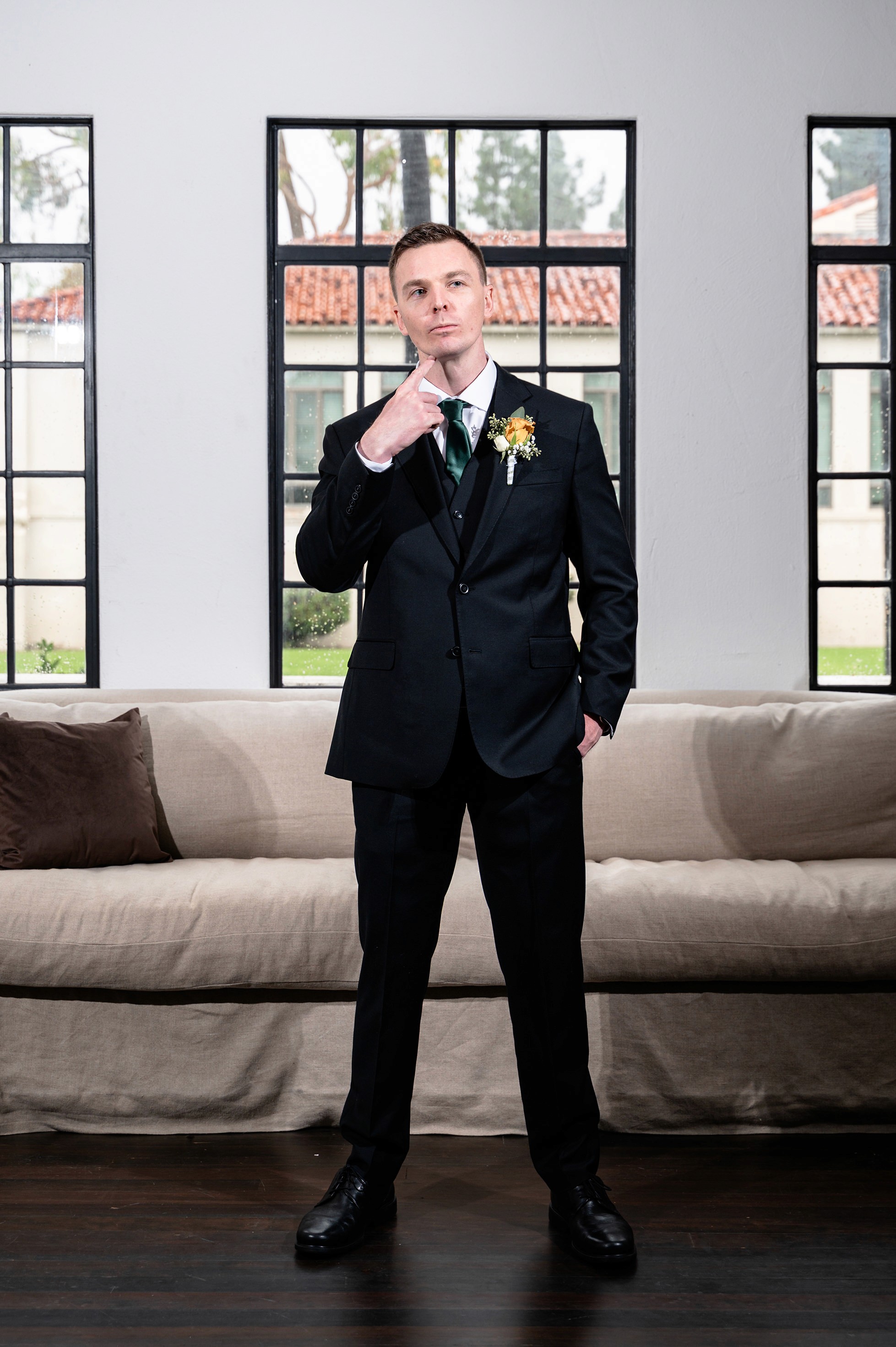 Flat lay wedding details with bouquet, rings, and sparkling bridal heels