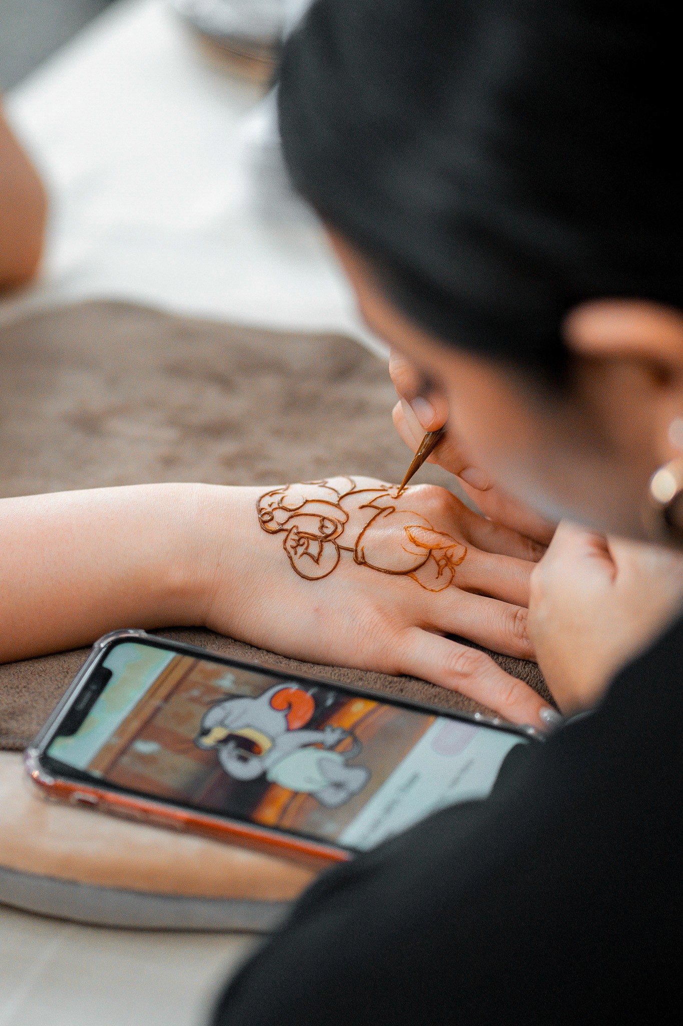 Custom henna of Jerry from Tom and Jerry drawn for a client at a corporate event.