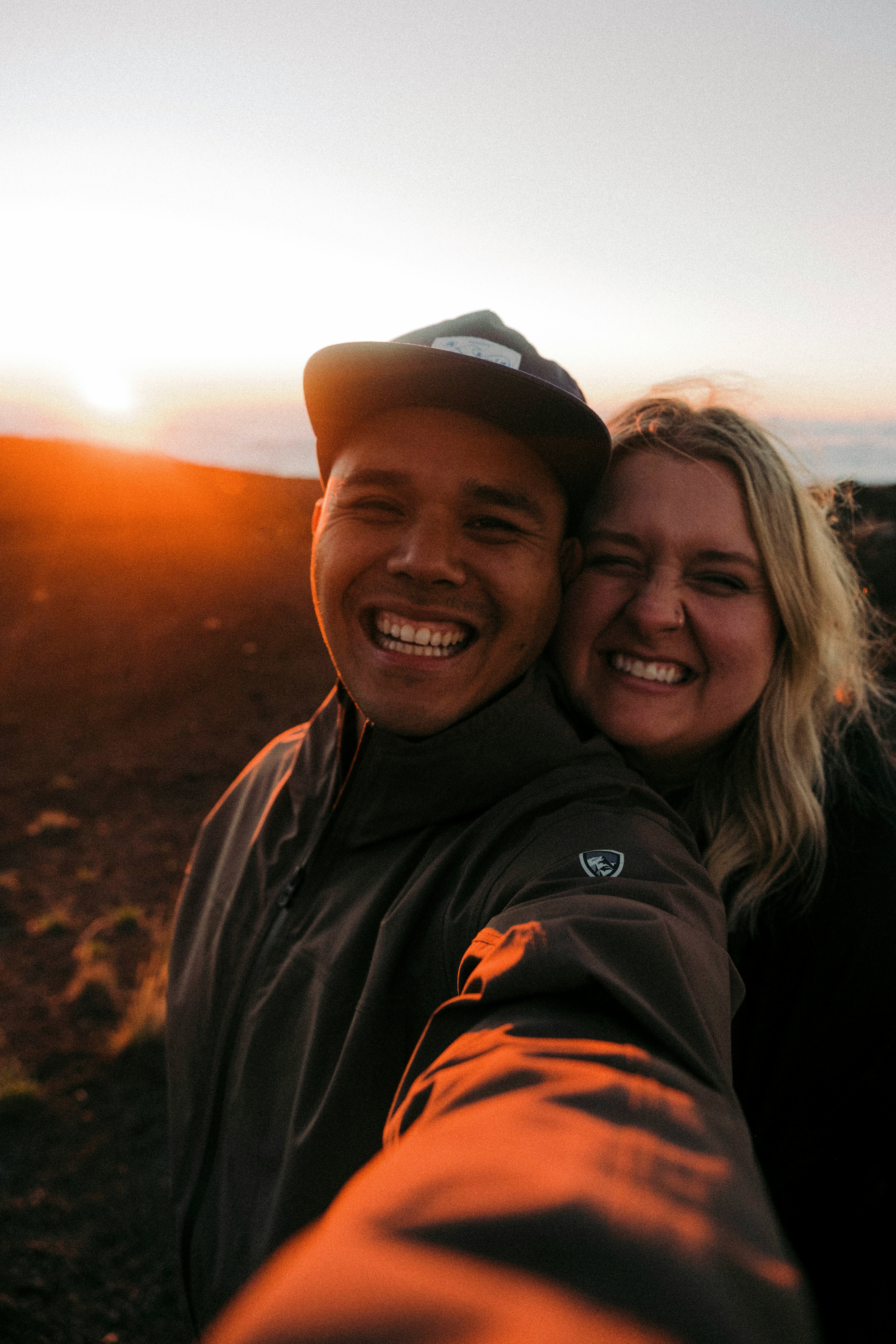 a man and woman taking a selfie