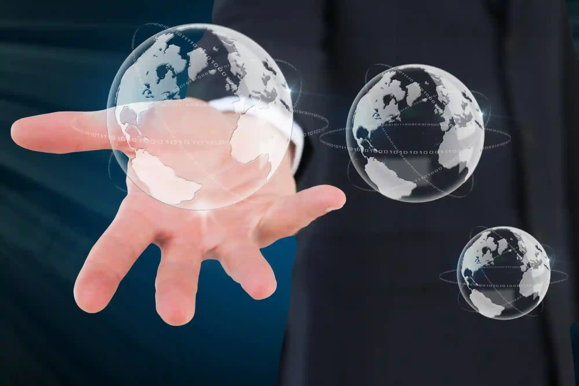 A businessman holding glowing digital globes, symbolizing global connectivity, international trade, and the reach of modern network technology.