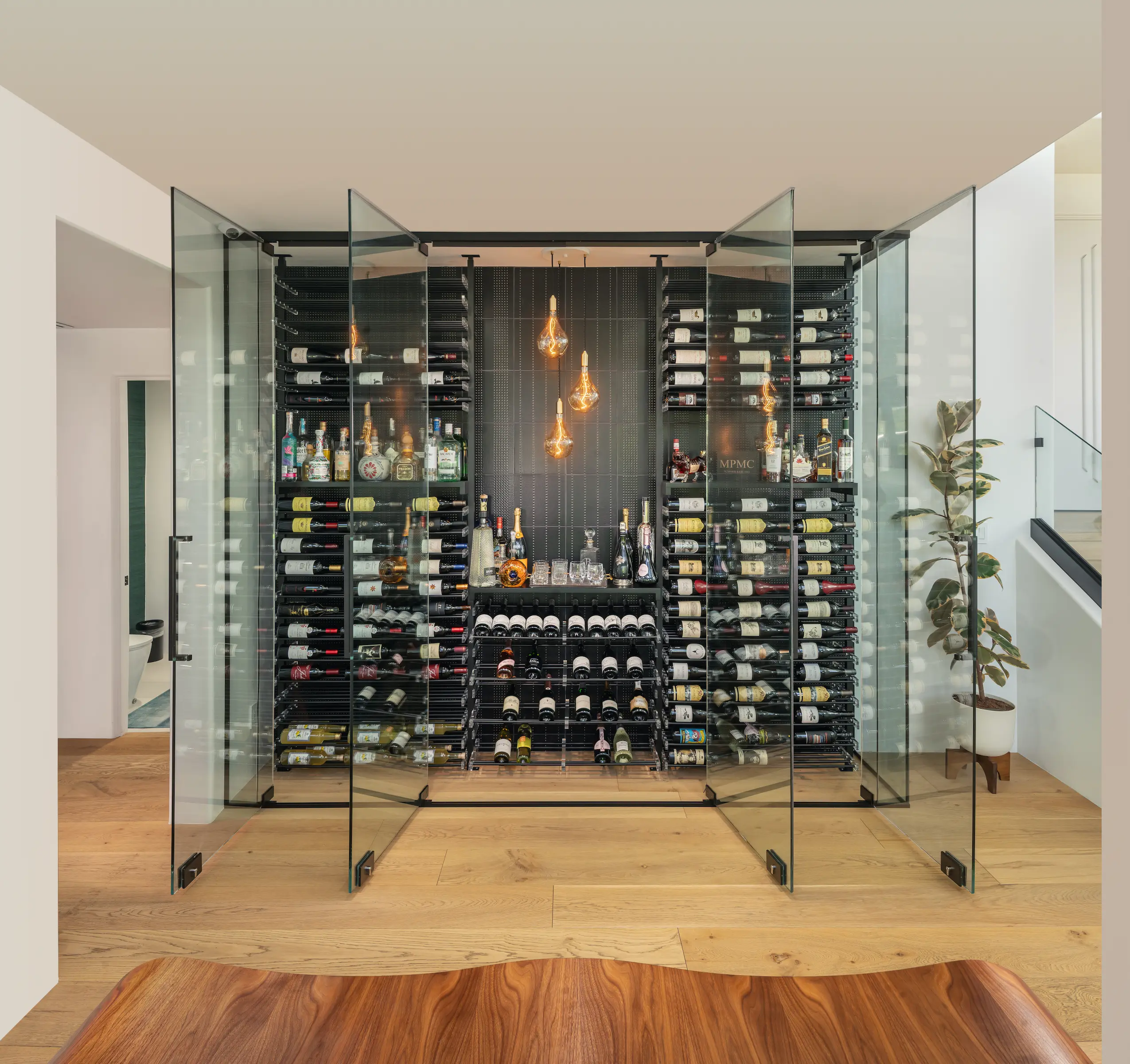 nfinity pool blending into the ocean view, minimalist sun loungers in soft neutral fabric, curved architecture