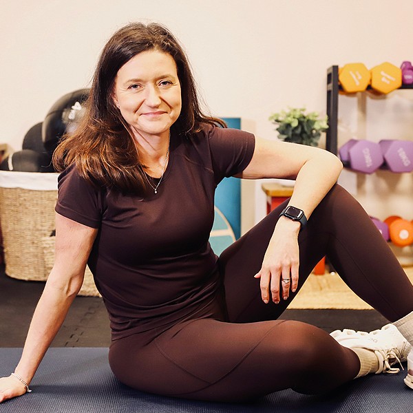 Crowborough personal trainer Sarah Marklew smiling in her gym studio..