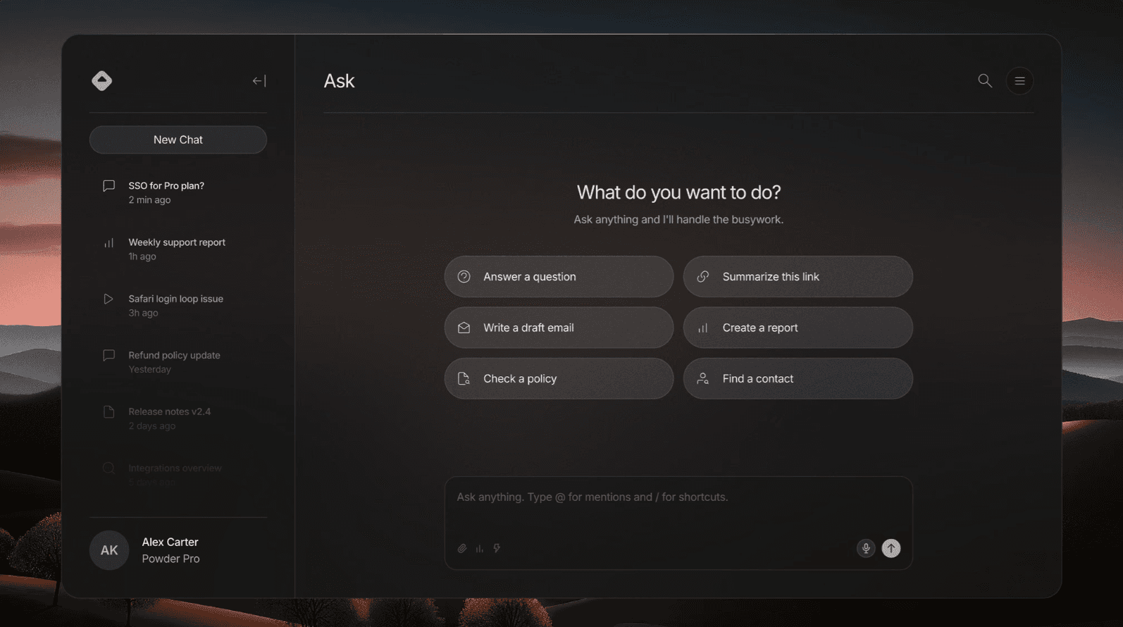 Empty state dashboard with quick-action prompts like "Answer a question" and "Write a draft email," conversation sidebar, dark theme with sunset background.