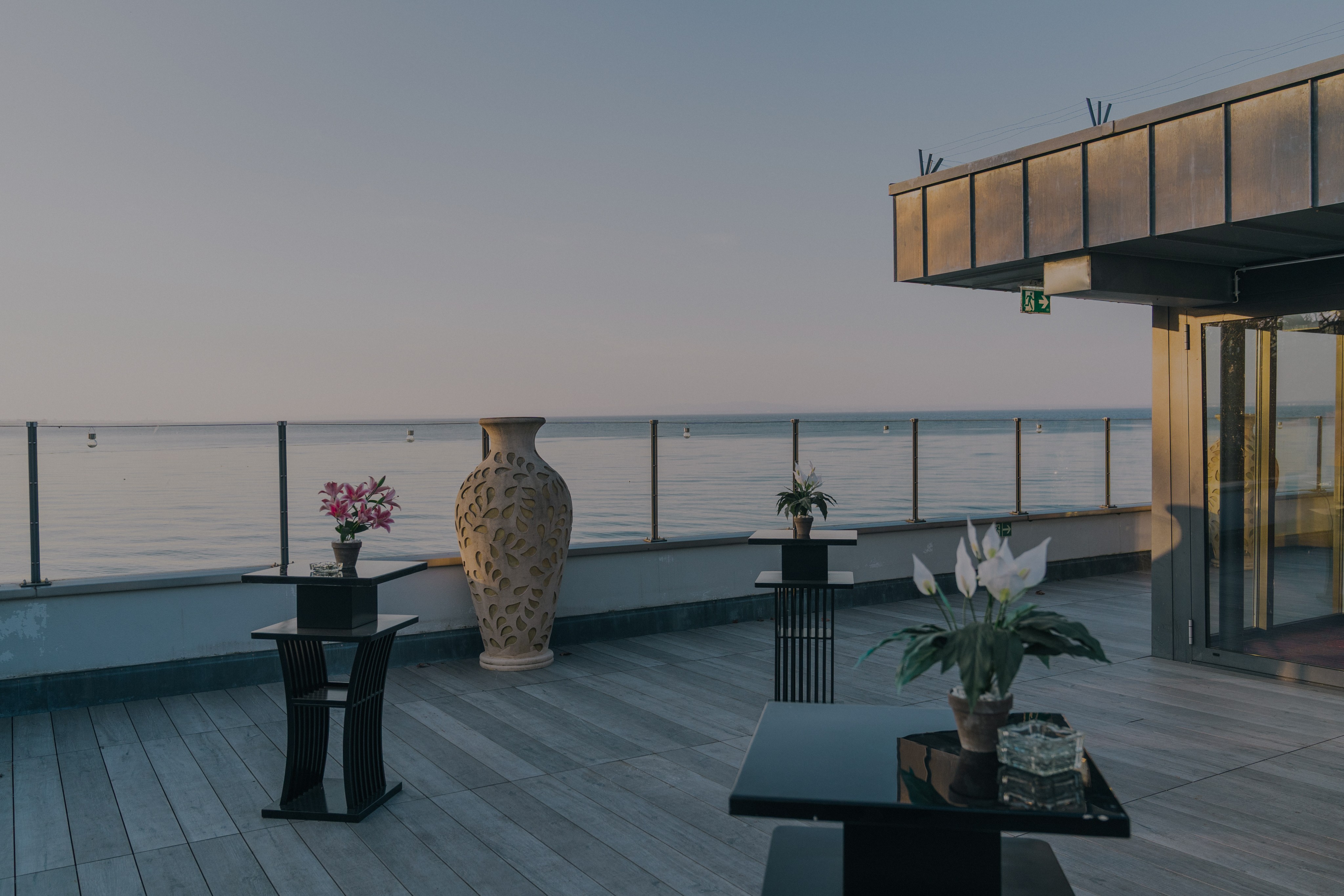 a restaurant with a view of the water
