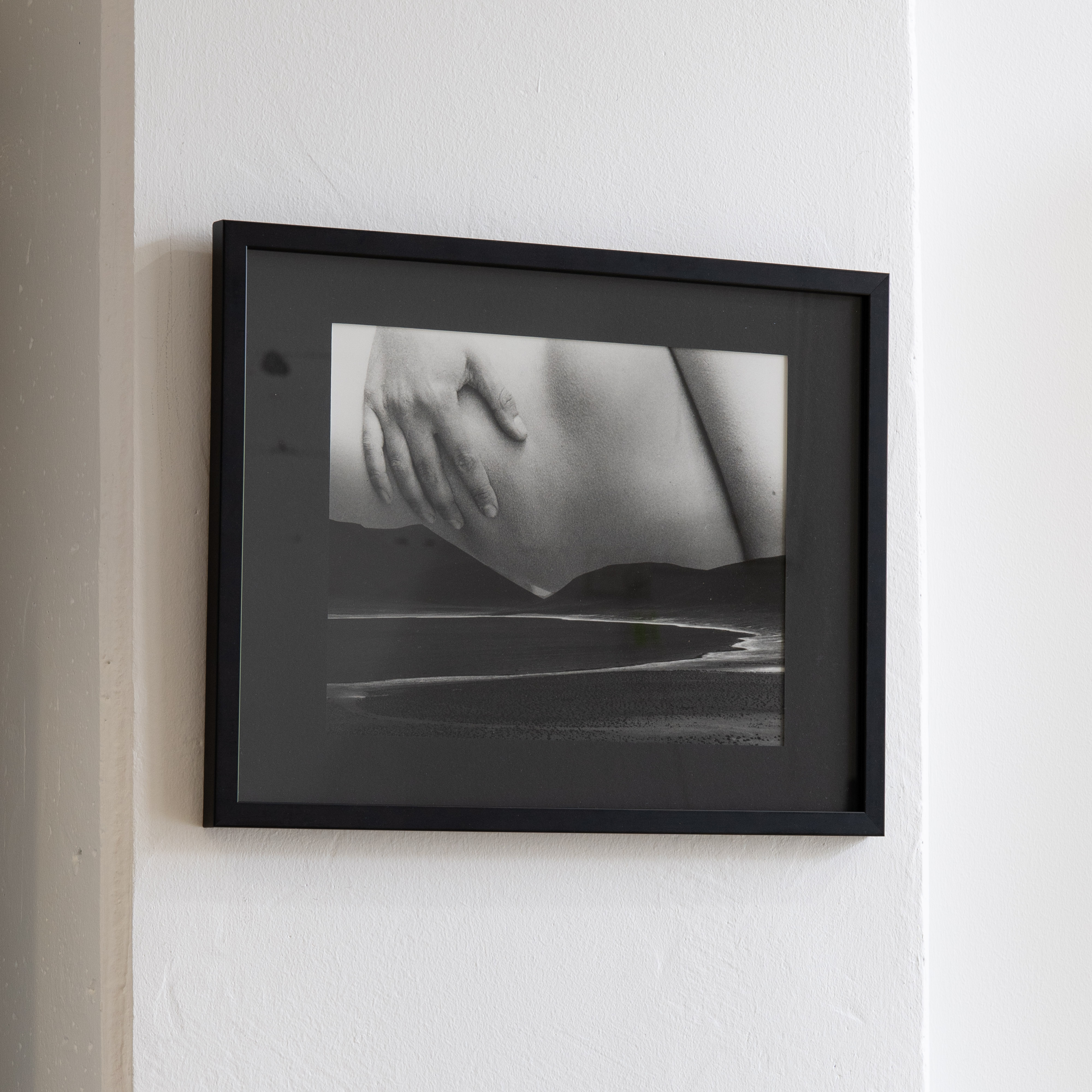 Darkroom prints drying on wire racks