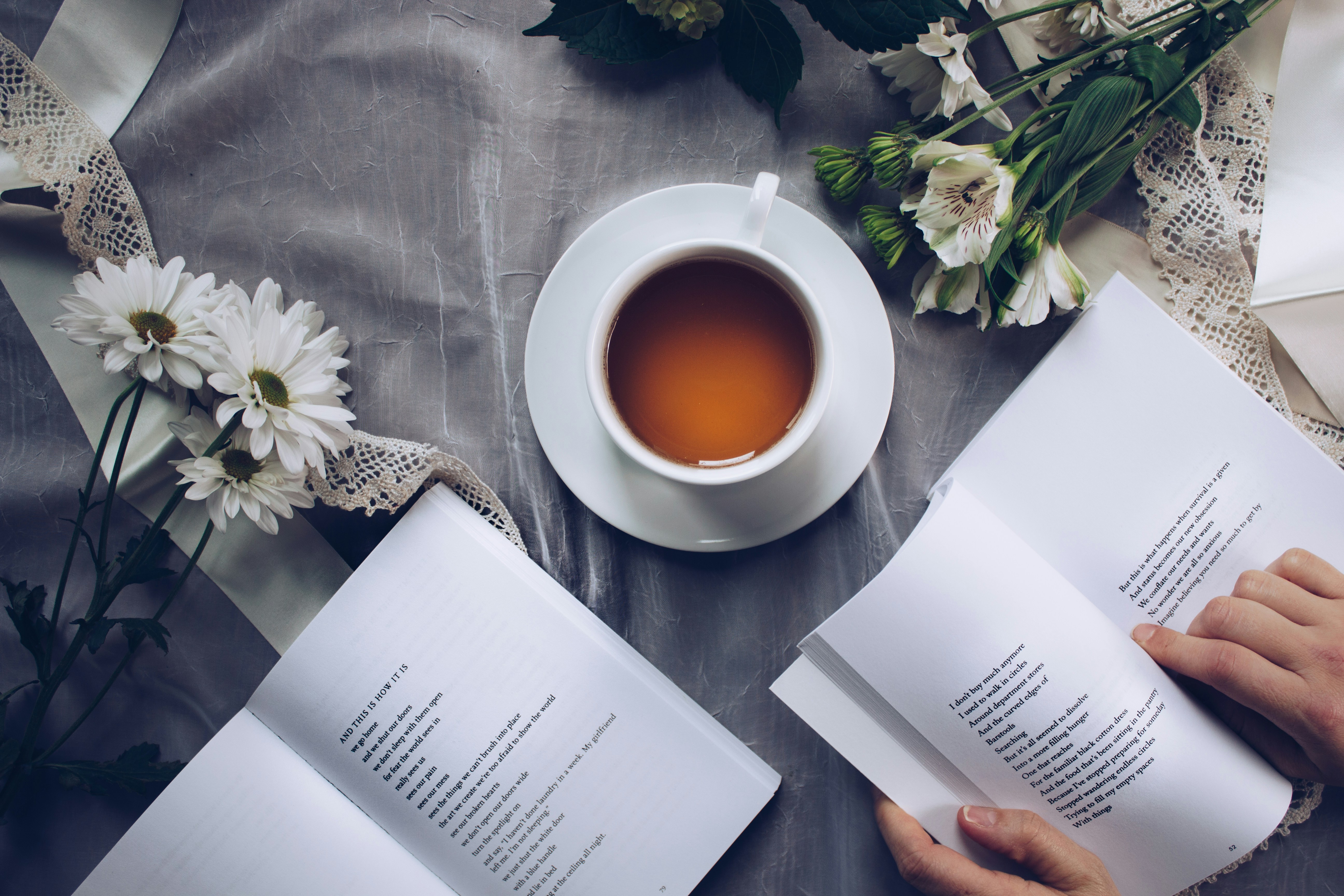 A Glass of Tea next to a book