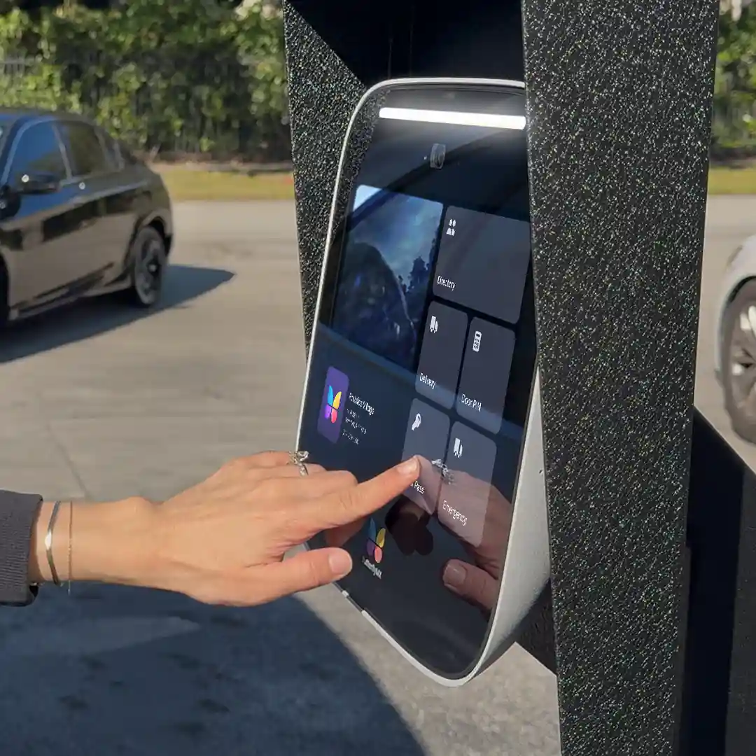 A smartphone displays a colorful app interface featuring images, text, and a QR code on an orange background.