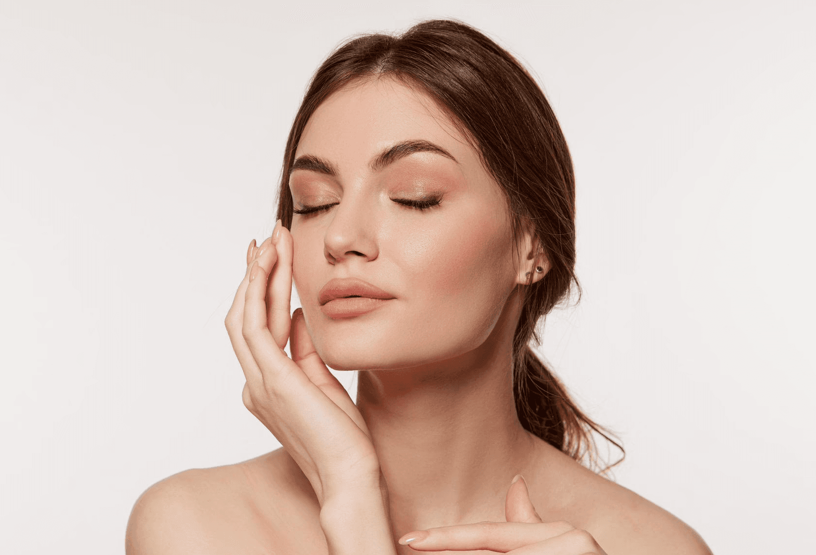 woman in white crew neck shirt smiling