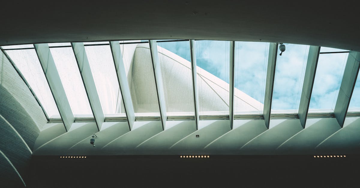 A modern architectural skylight with a clear view of the sky displaying innovative design.
