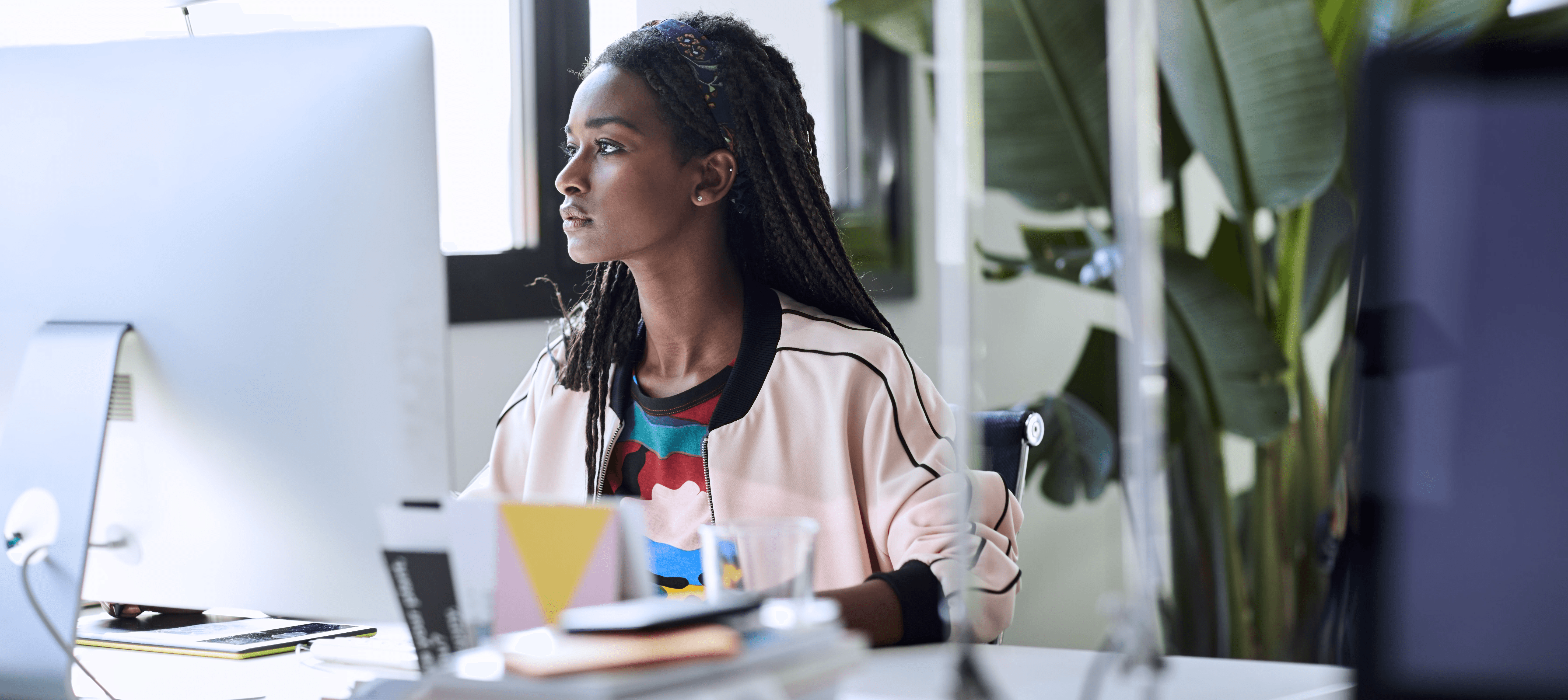 Lady sitting behind a computer
