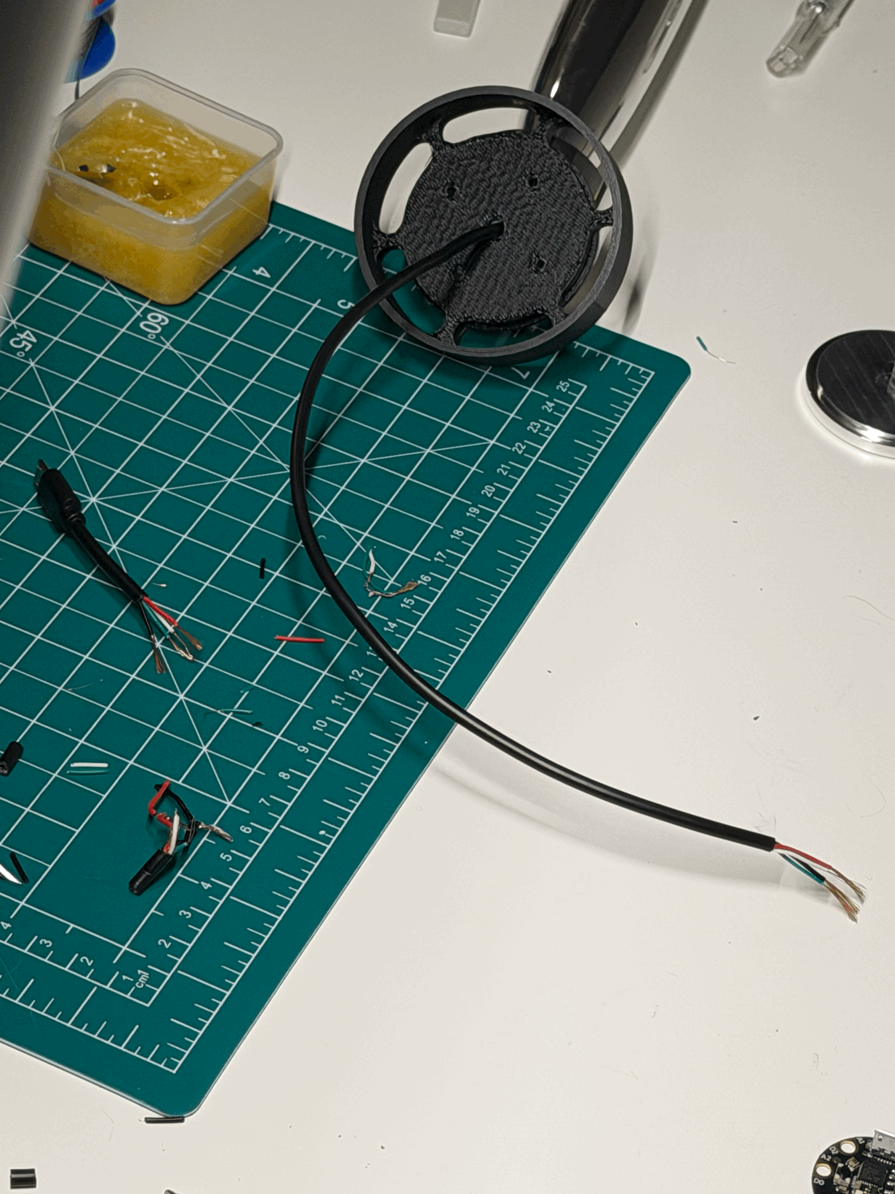 Batch.Works logo over a photo of a box of 3D printed objects