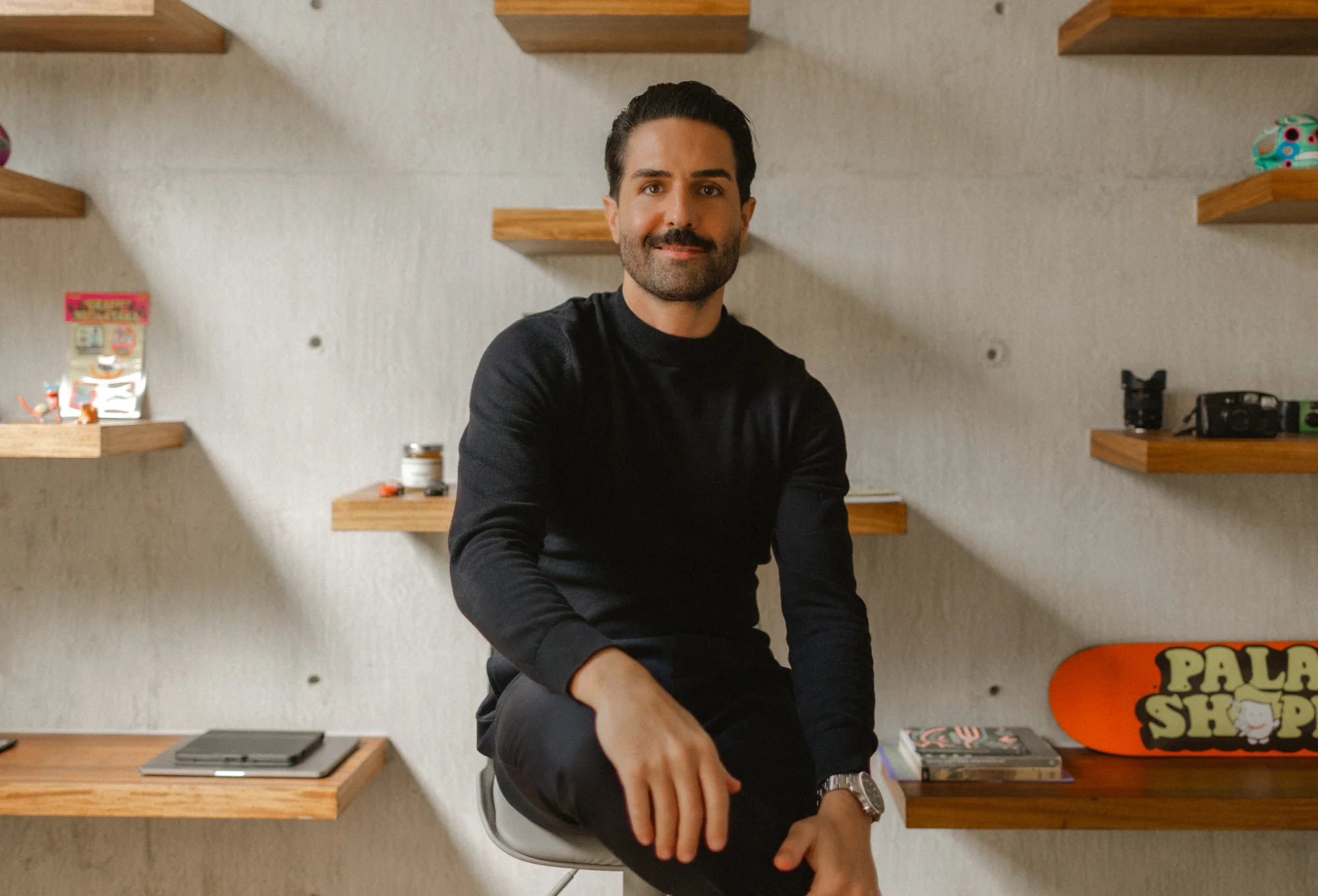 Photo of Keith Paul Acton in his design studio