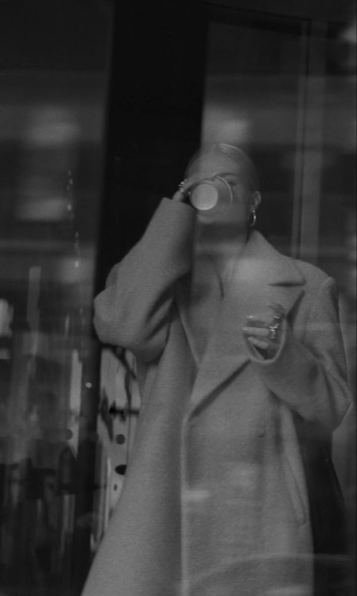 A close-up of a shelf with ceramic vases on it