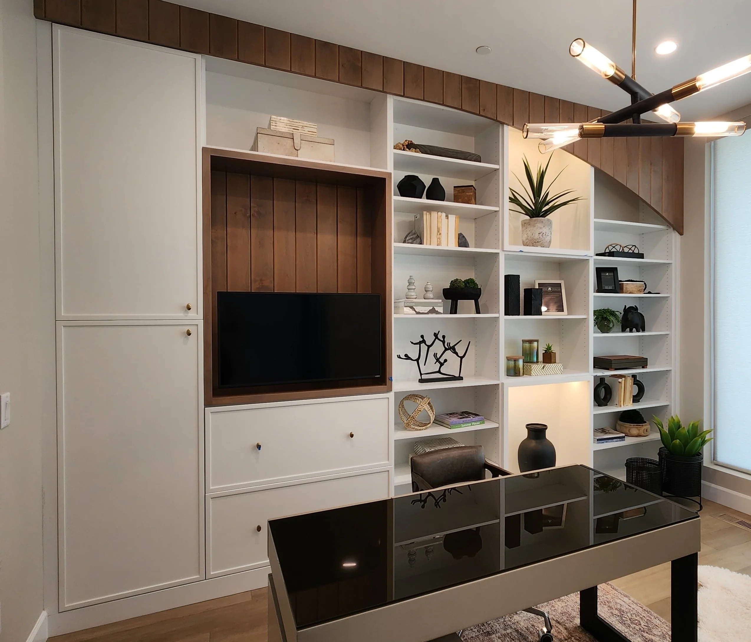 a wood cabinet with a white wall