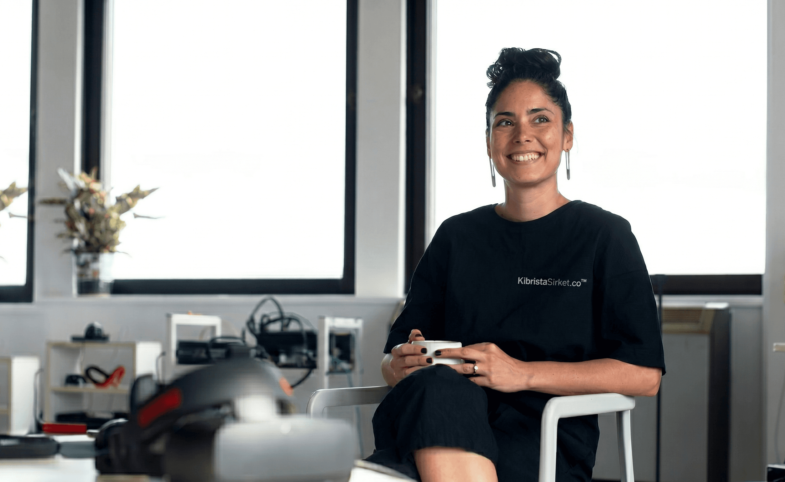 Man with a laptop walking to a store