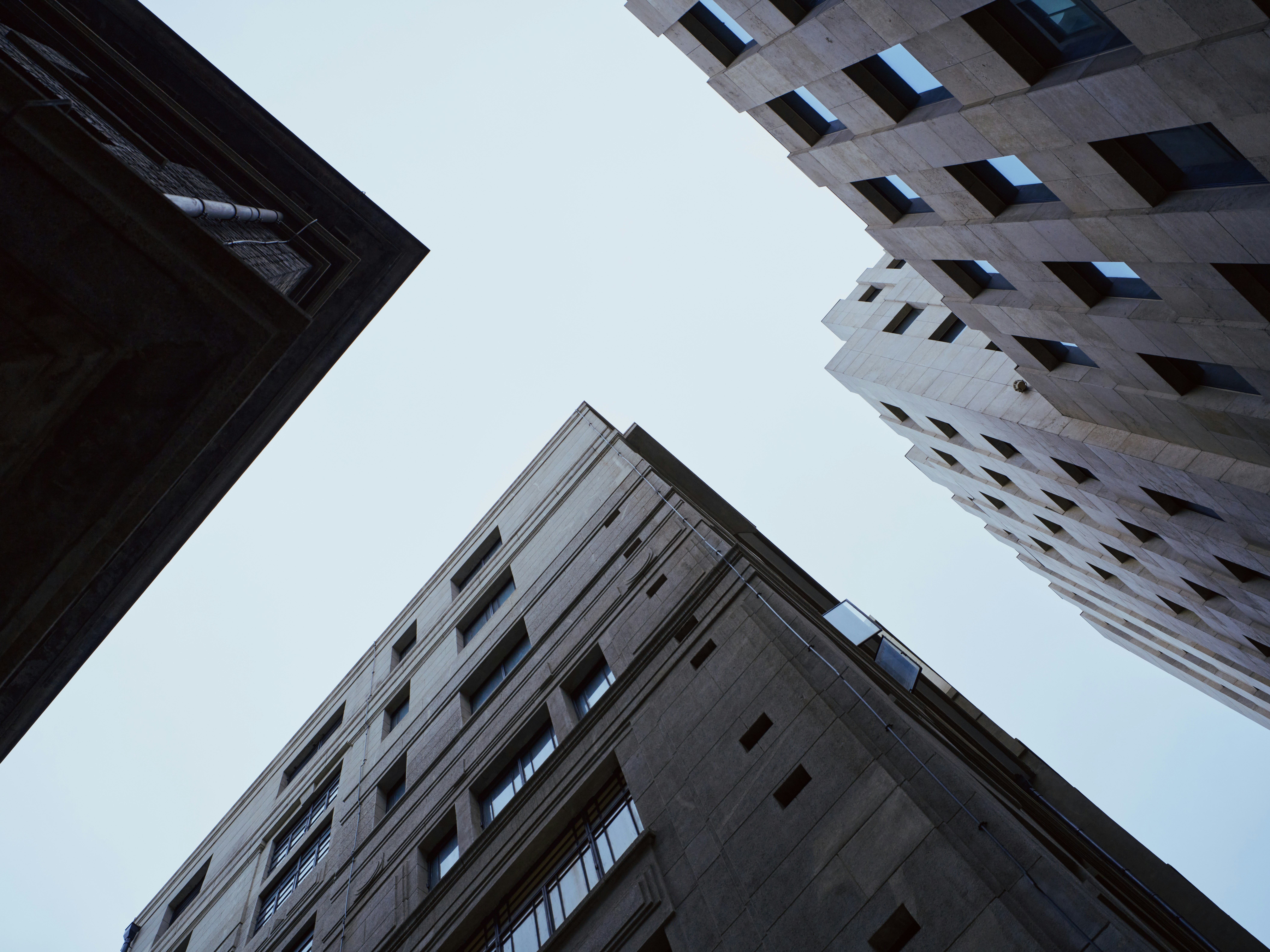 Tall buildings reaching up towards the sky.