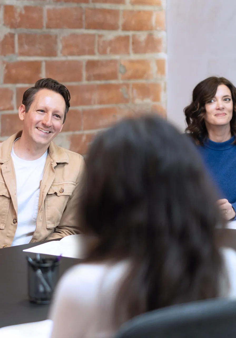 Team meeting and smiling