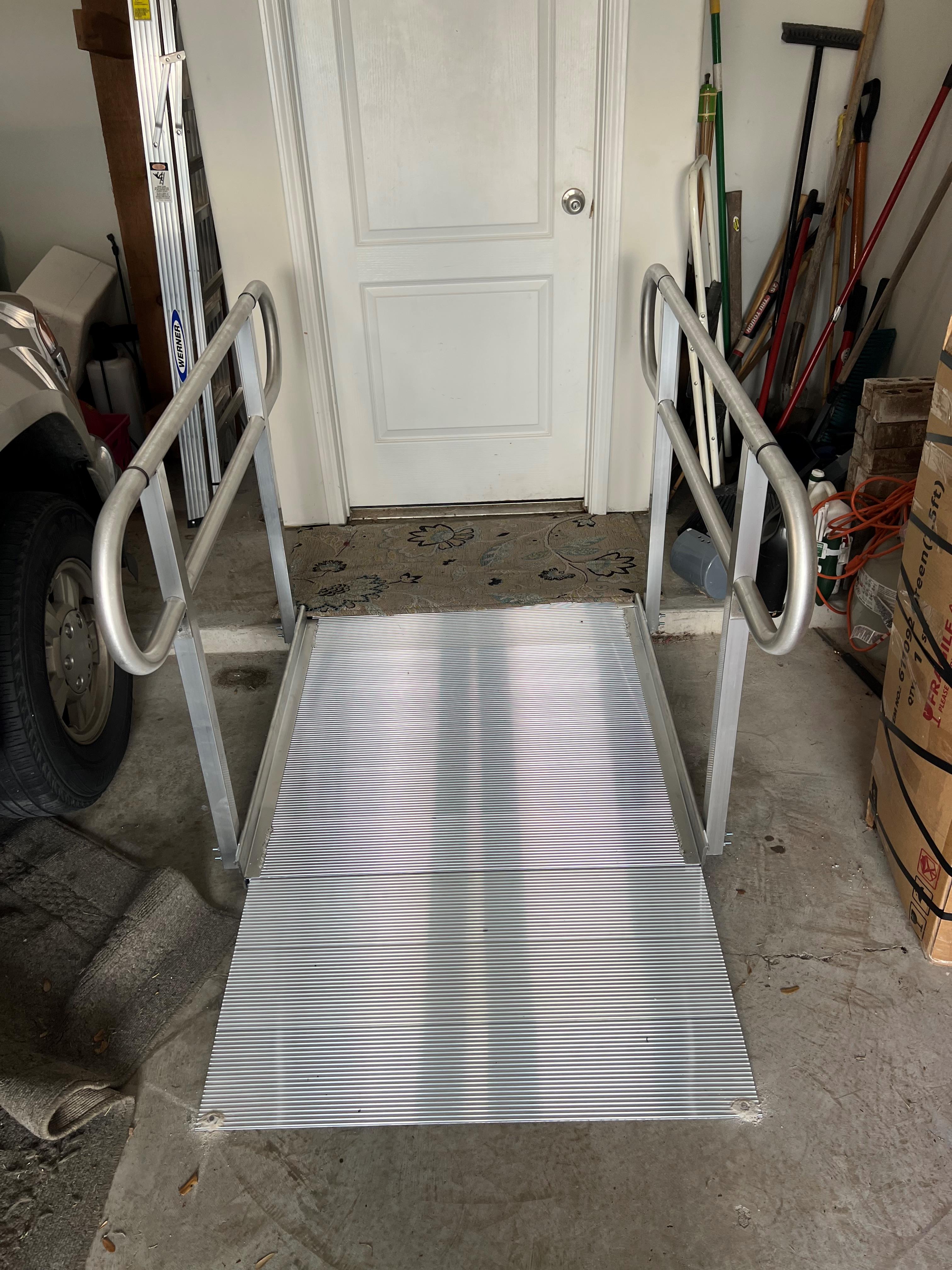 Aluminum modular wheelchair ramp installed for a veteran