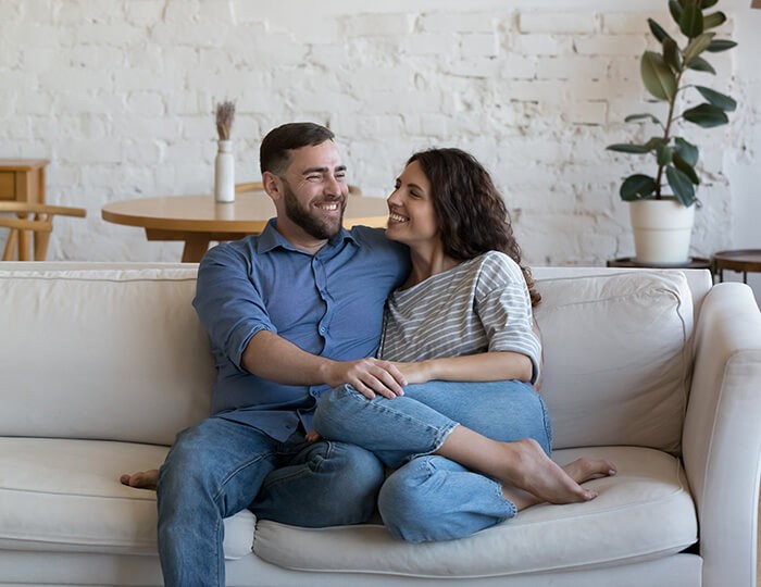 couple sitting on couch together
