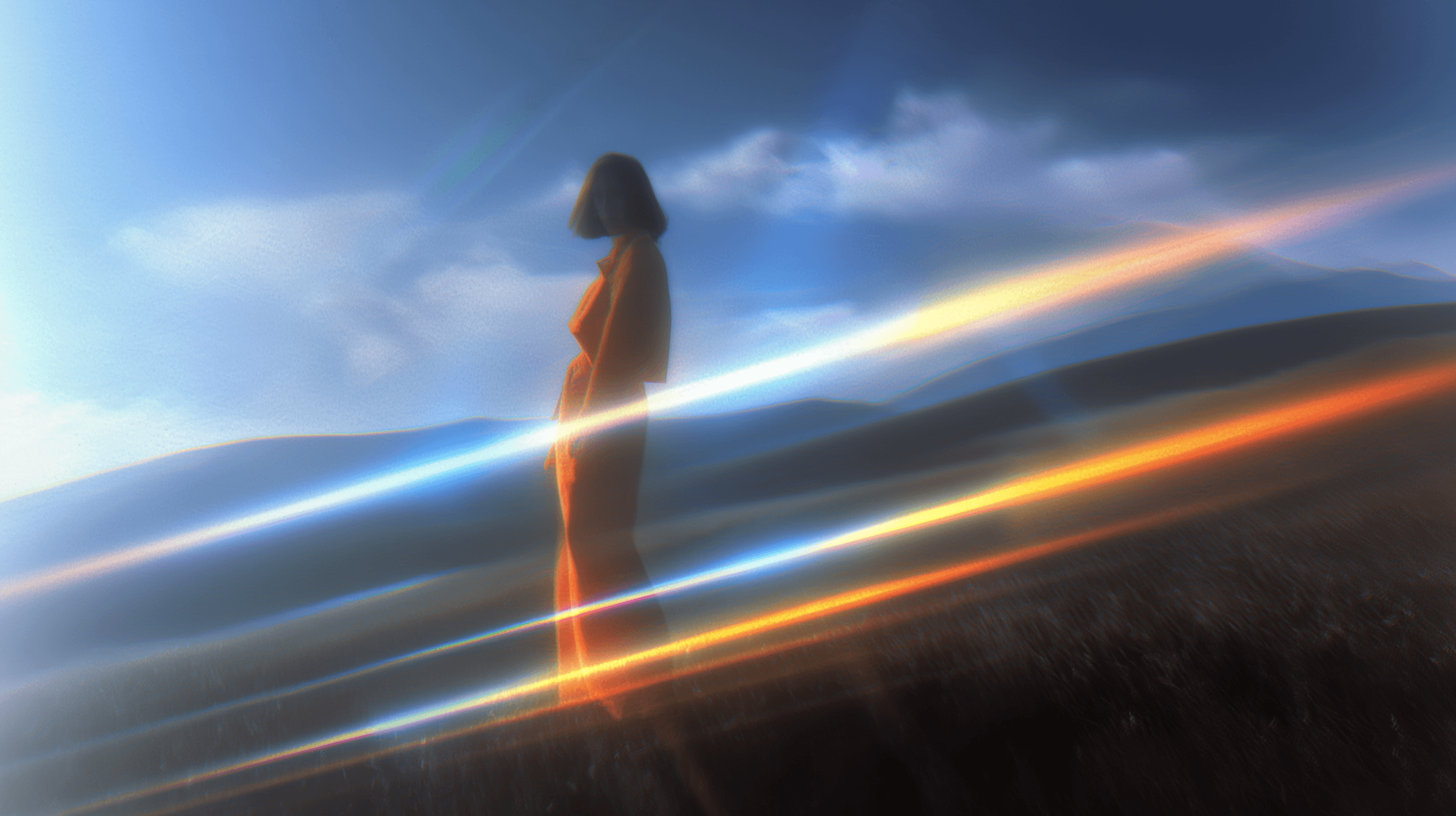 Tree branches reach towards a clear, blue sky.