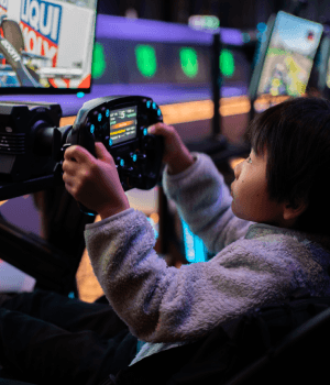 Child playing on the racing rigs