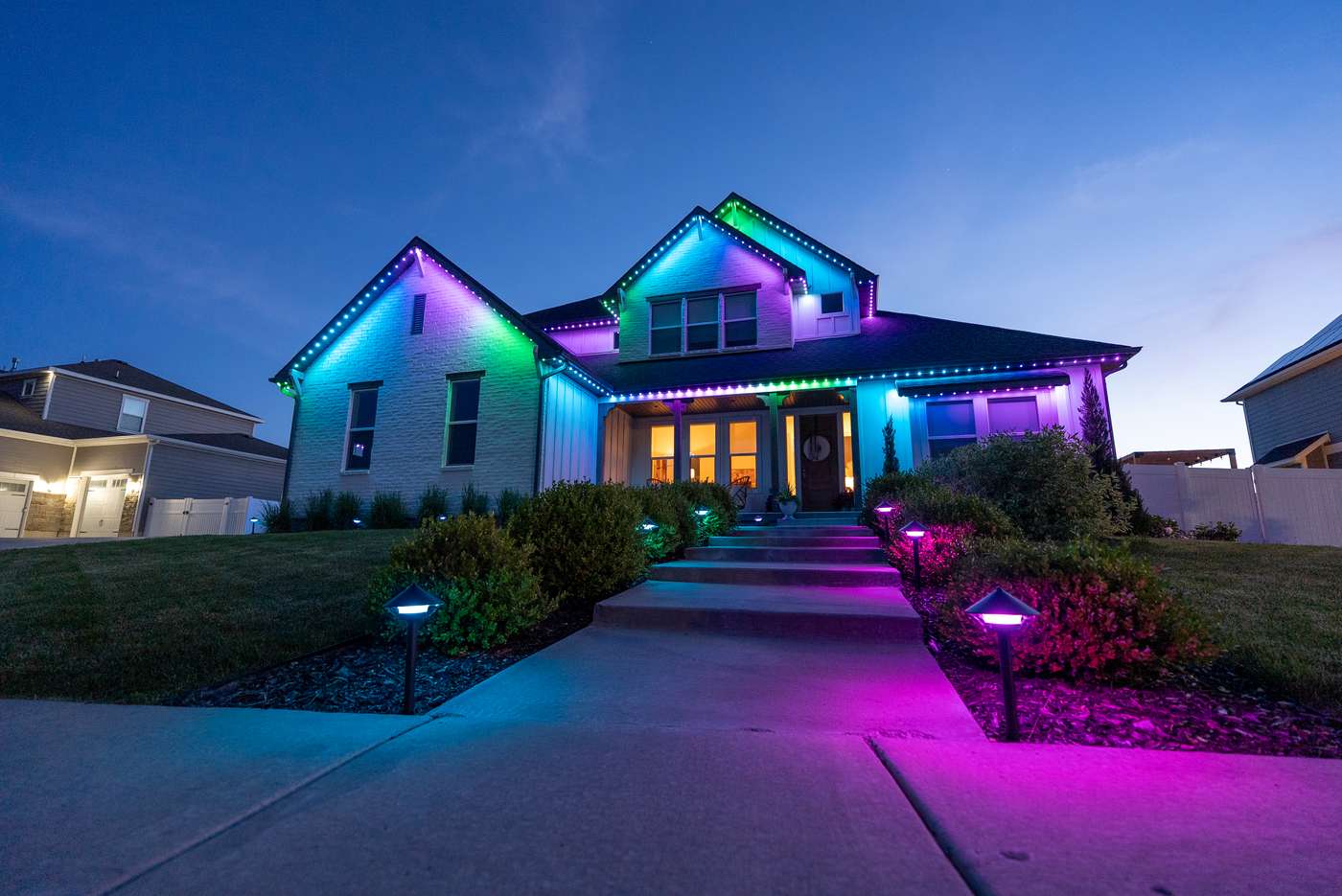Colonial home with LED roofline lights