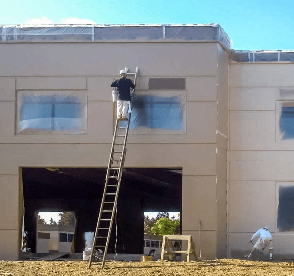 commercial painting services being done in the exterior of a commercial property