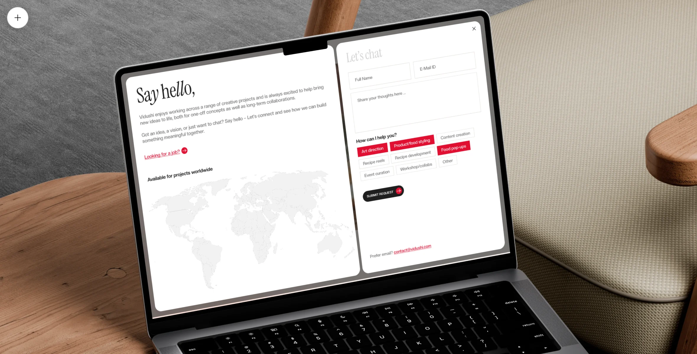 Vidushi Singhania portfolio contact page with project inquiry form, displayed on a laptop.