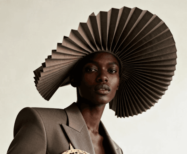 three men standing outdoors