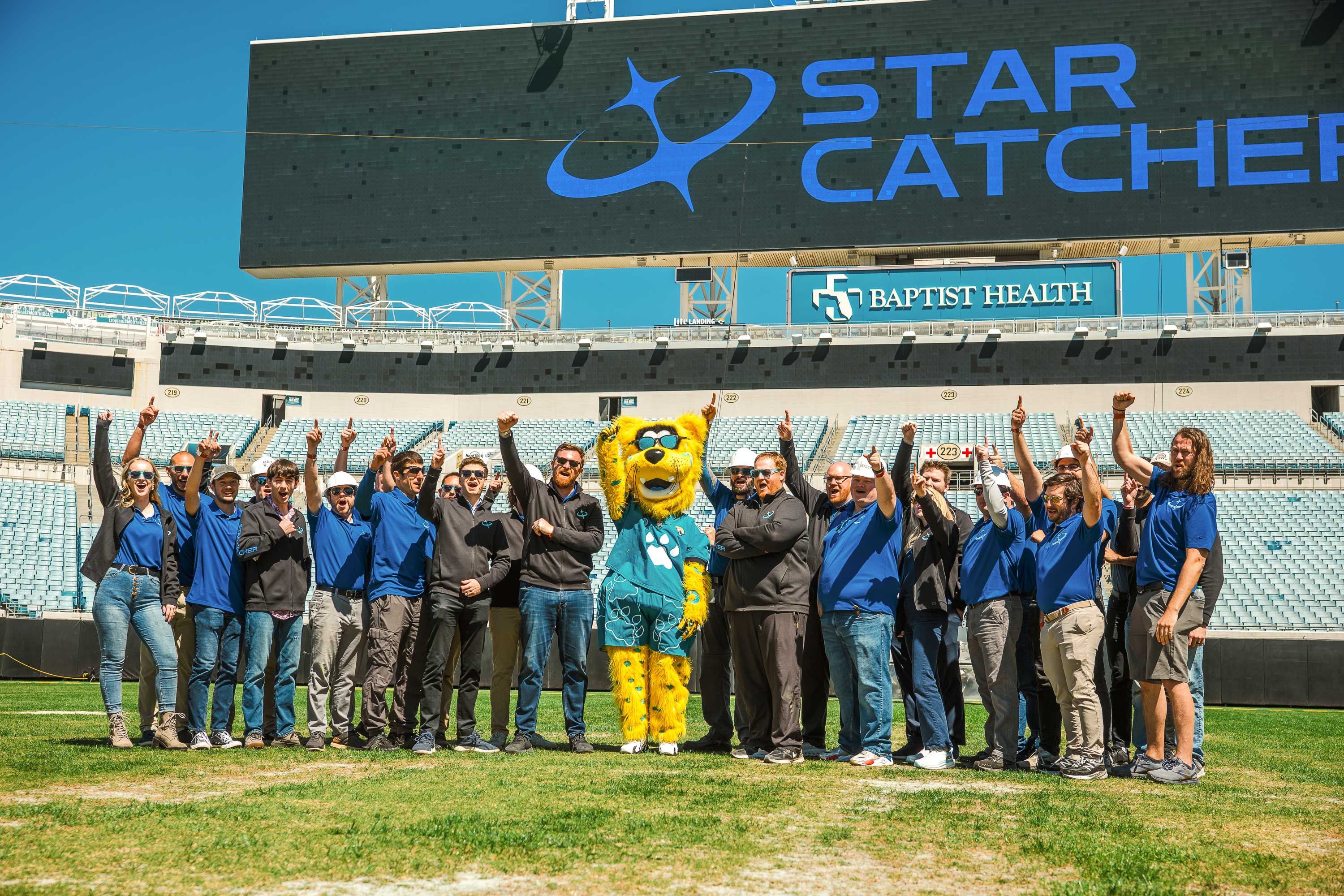 Star Catcher team with Jacksonville Jaguars' masscot Jaxson de Ville at EverBank Stadium test