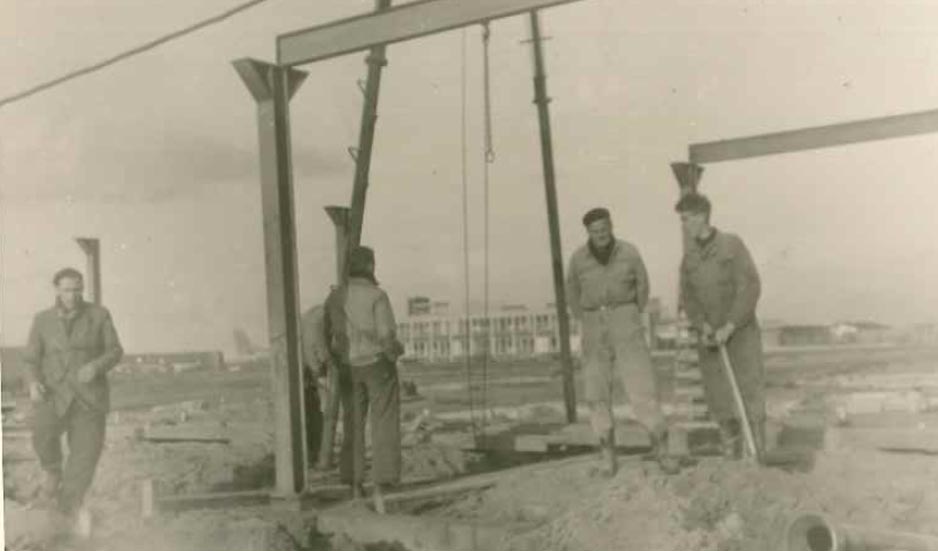 white wooden shelf near white wall