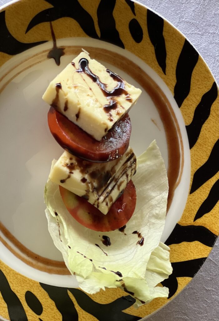 Tomato cheese on a plate.