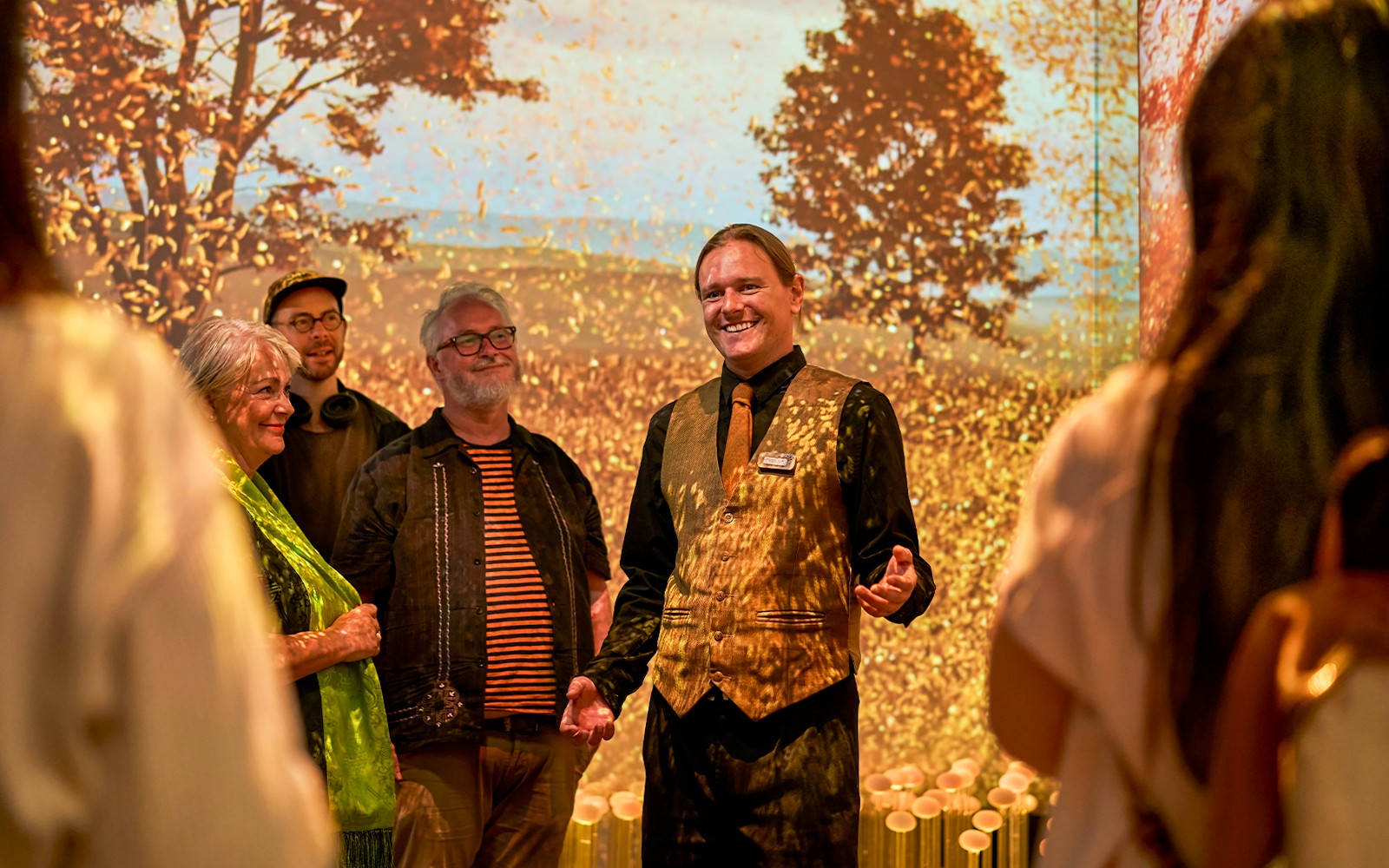 Visitors with a guide on a sensory journey through the Scotch Whisky Experience in Edinburgh, Scotland.