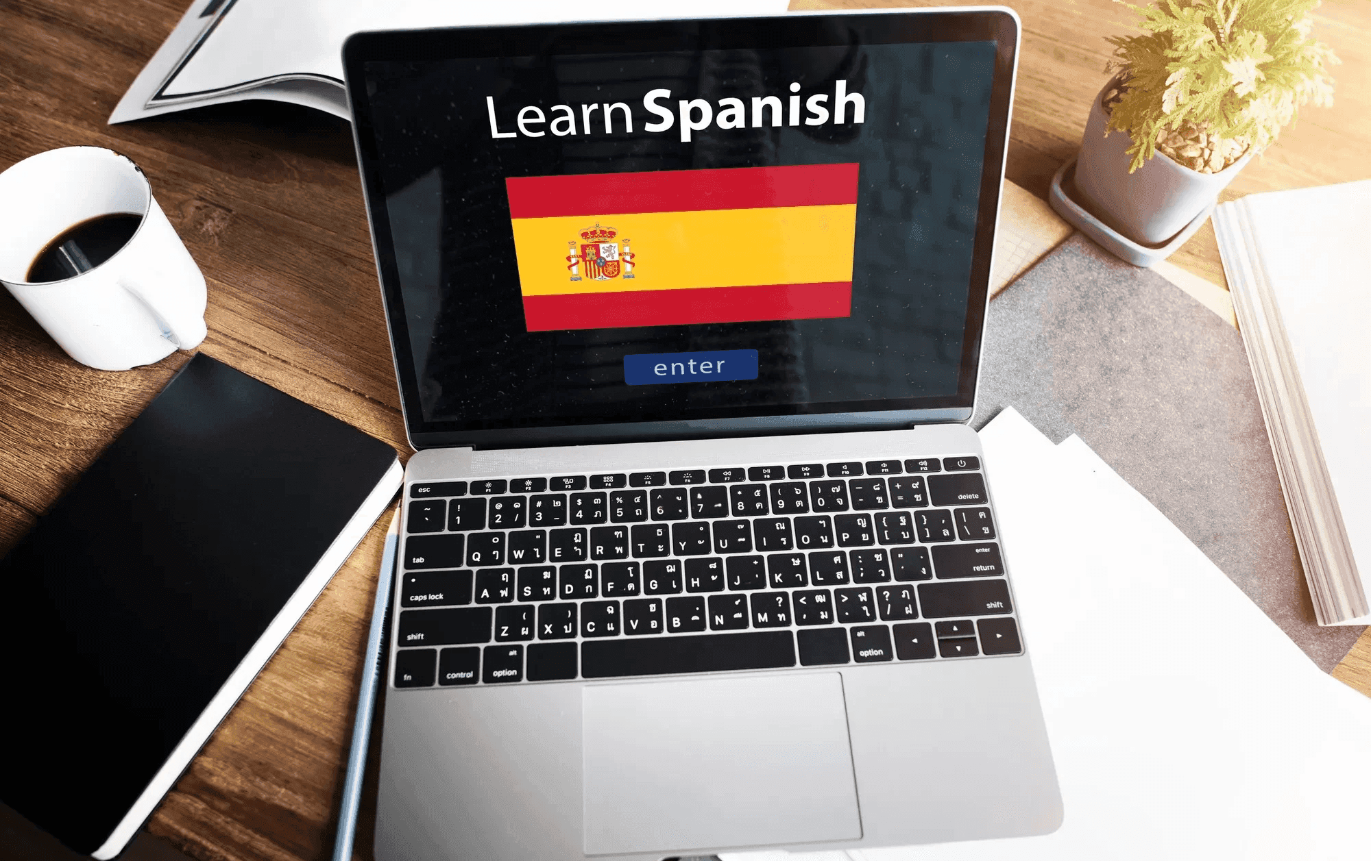  Laptop showing online classes for Spanish -  Online Spanish Courses for Adults
