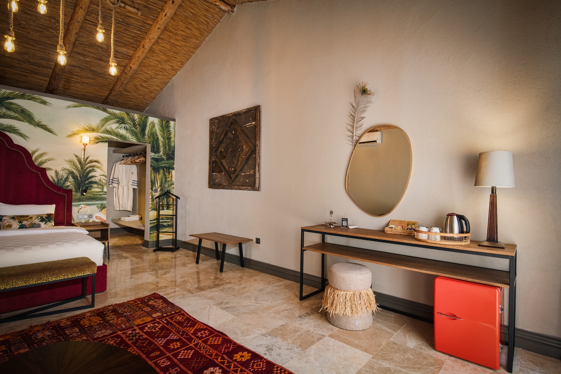 Living area composition, mid-century modern sofa, light wooden coffee table, woven textures, and curated coastal decor.