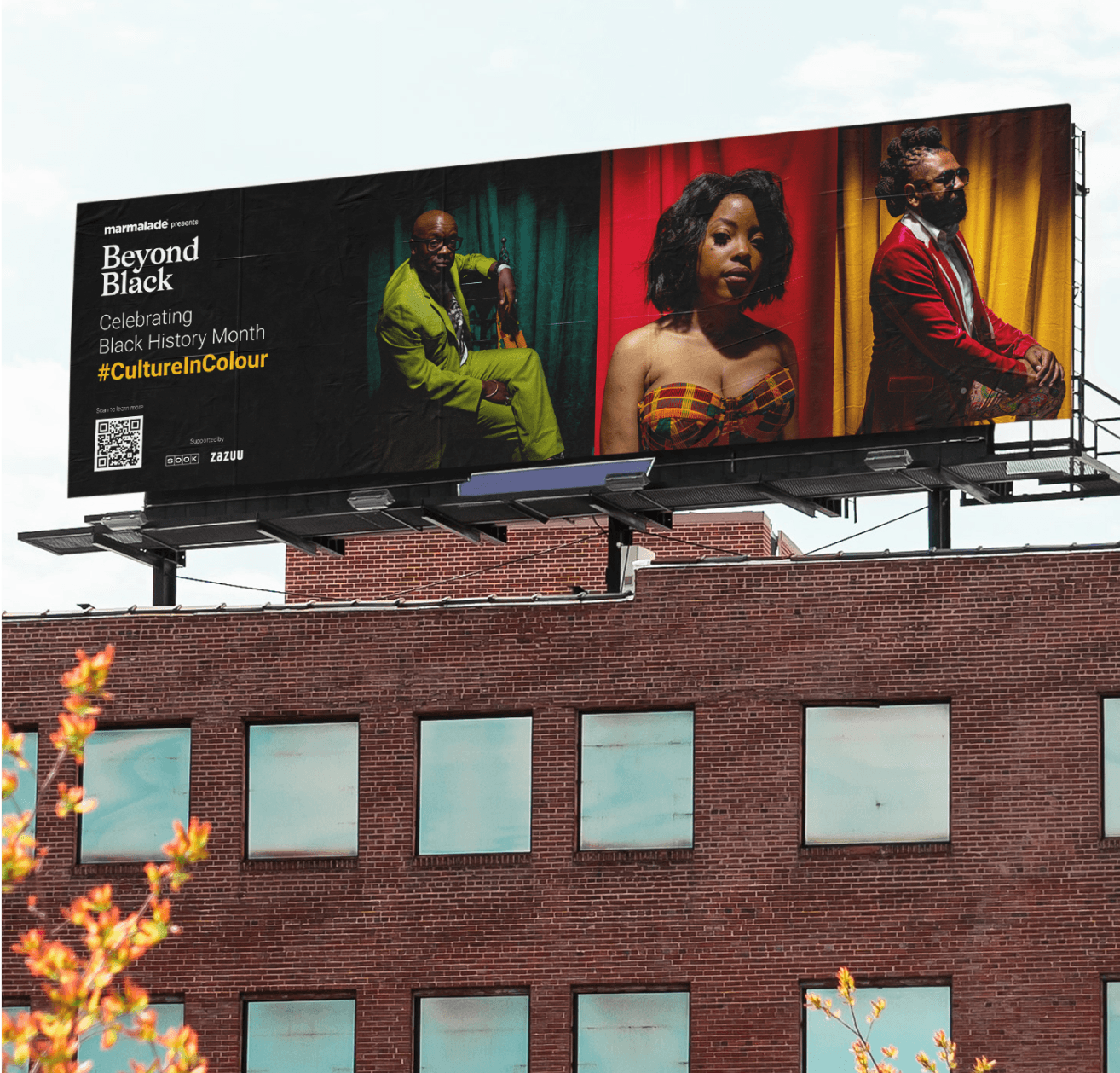 a cellphone leaning against a wall